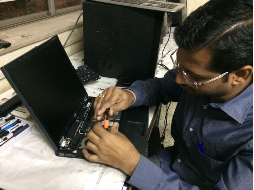 Laptop repair training with circuit board